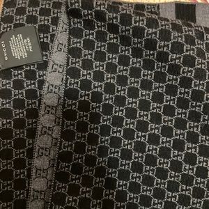 SOLD.       Gucci reversible wool scarf